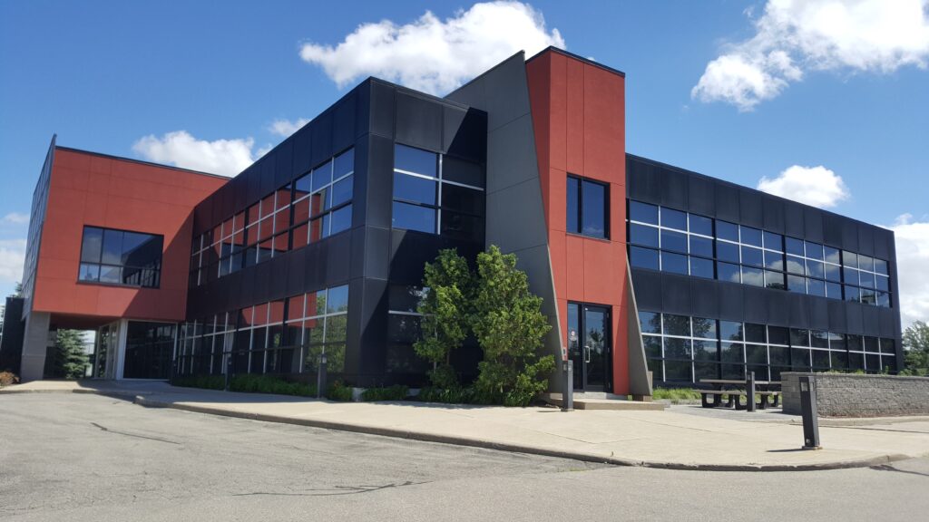 Modern mid-rise commercial building representing office real estate opportunities